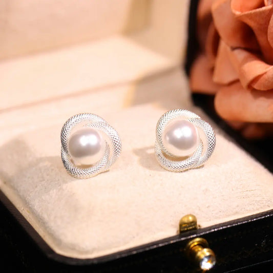 Rotating Pearl earrings