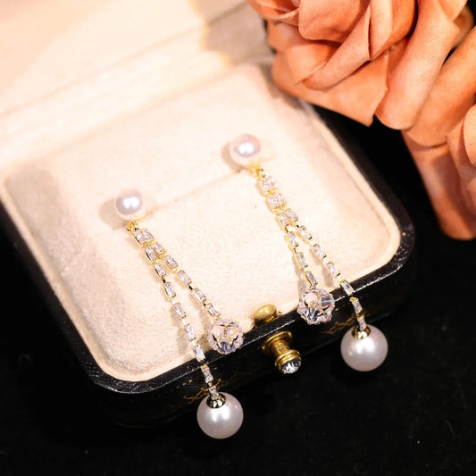 Long pendant pearl earrings