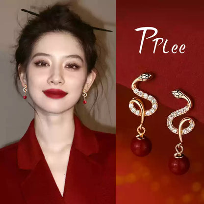 Silver snake-shaped ruby Earrings - Bad Luck Banisher