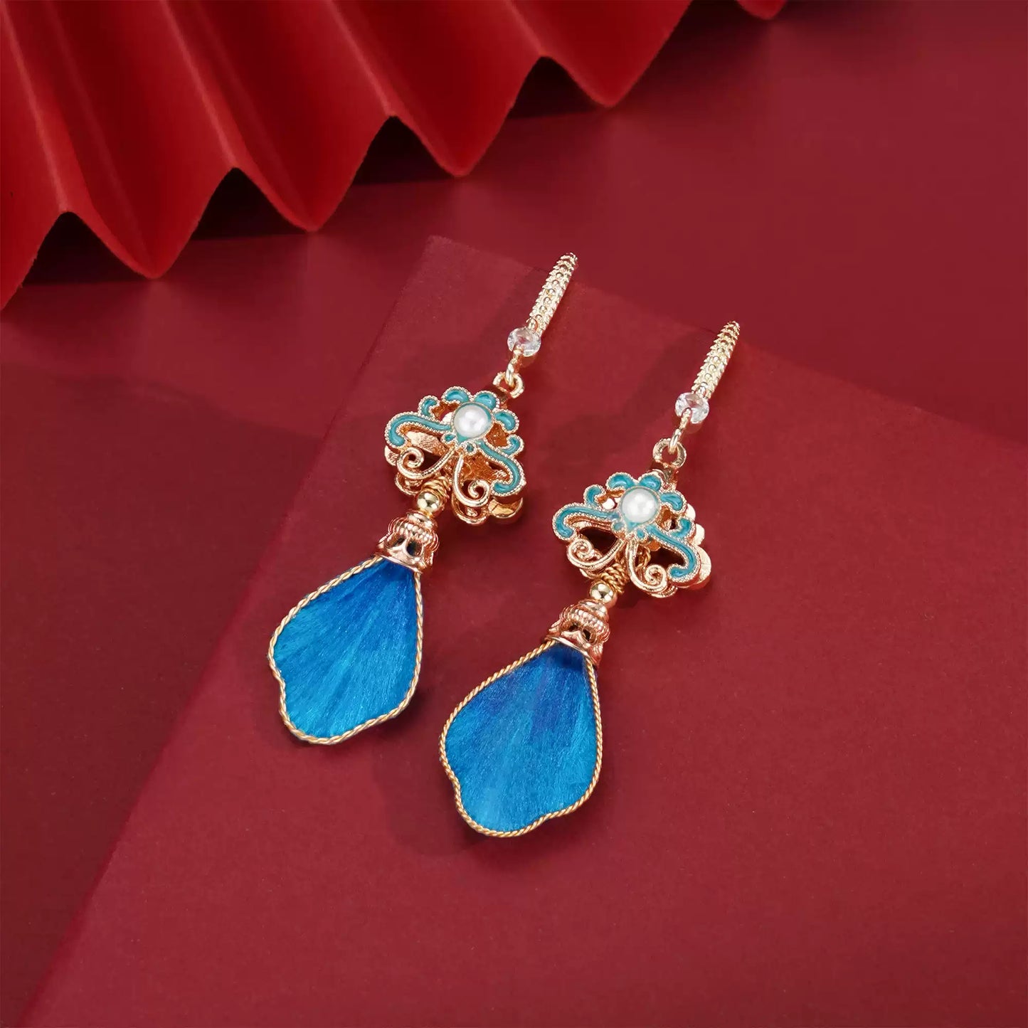 blue feathers earrings