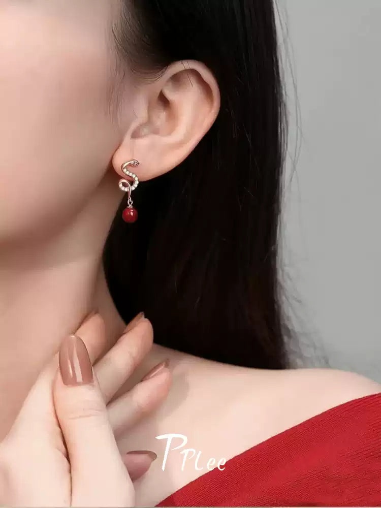 Silver snake-shaped ruby Earrings - Bad Luck Banisher