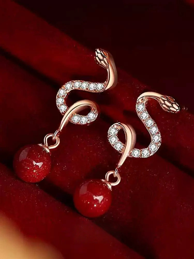 Silver snake-shaped ruby Earrings - Bad Luck Banisher