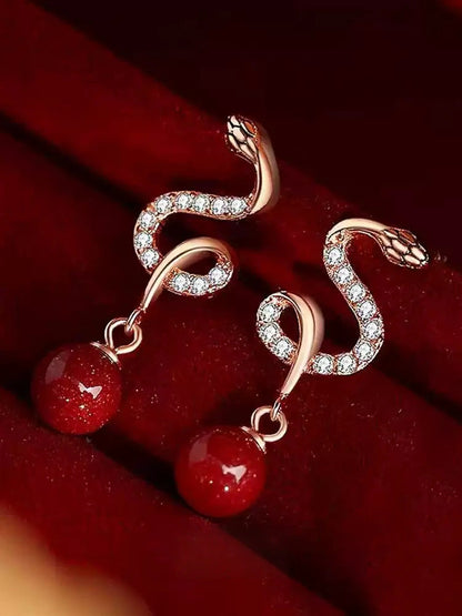 Silver snake-shaped ruby Earrings - Bad Luck Banisher
