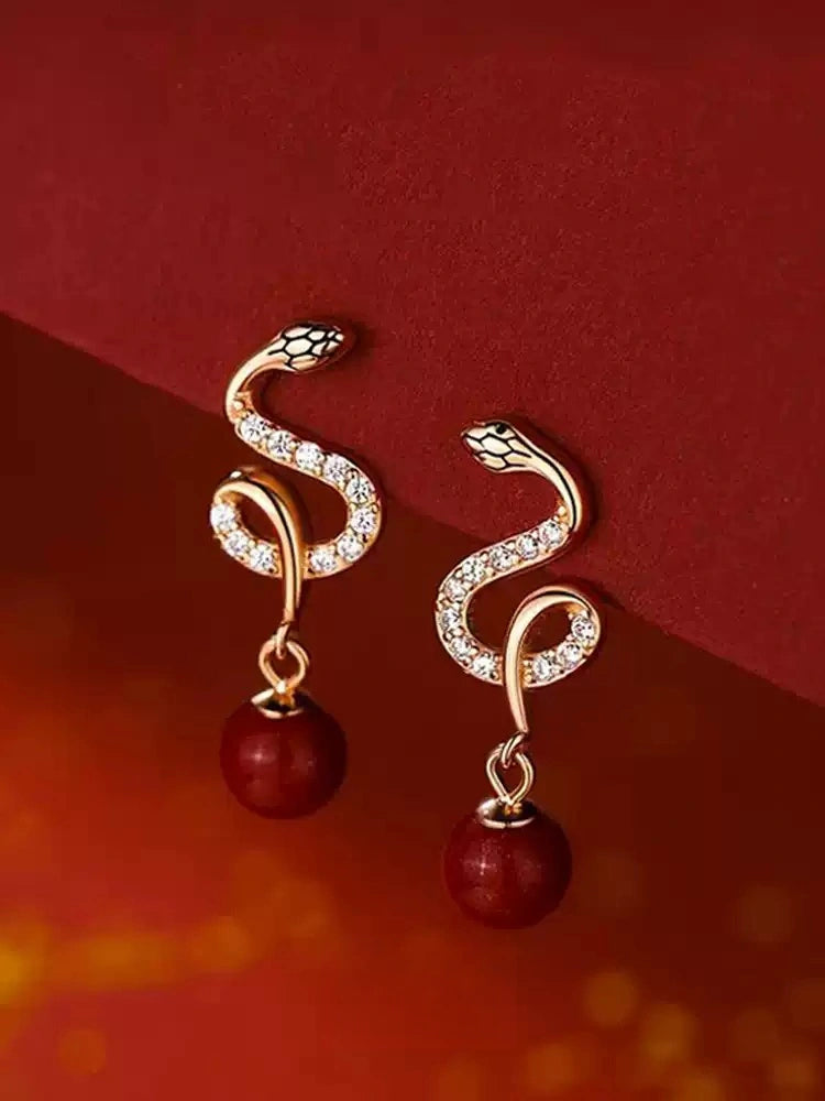 Silver snake-shaped ruby Earrings - Bad Luck Banisher