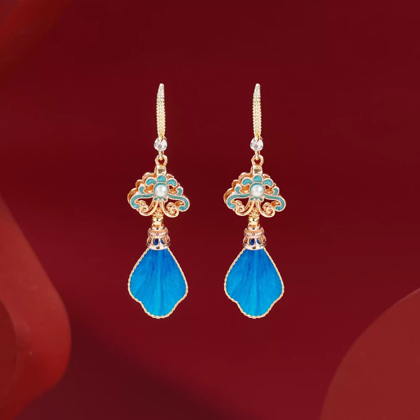 blue feathers earrings