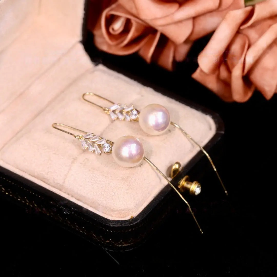 Long pendant pearl earrings