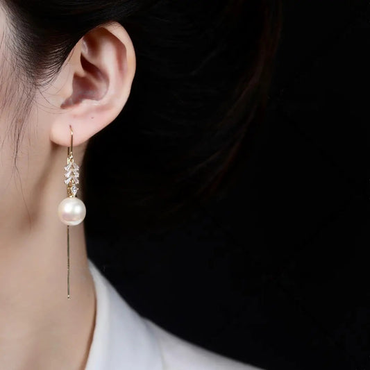 Long pendant pearl earrings